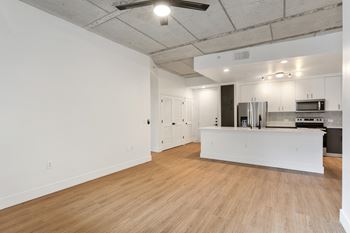 Noise reducing concrete beneath navajo wood flooring*